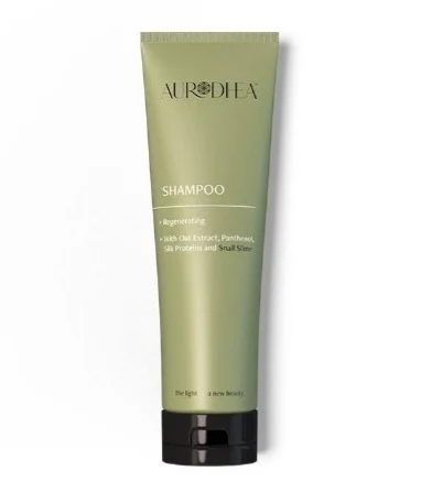 Shampoo Chogan bienêtre en soit à la bave d'escargot, flacon avec étiquette, visible sur fond blanc.