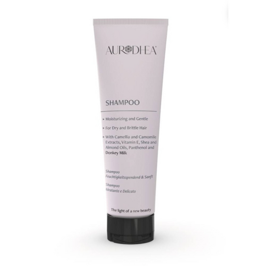 Shampoing bienêtre en soit à base de lait d'ânesse, 250 ml pour cheveux doux et hydratés, bouteille avec étiquette bleue.