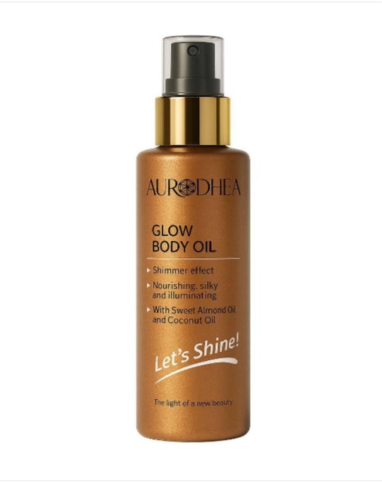 Huile corporelle Glow Body Oil Aurodea de bienêtre en soit, soin visage et corps, texture légère et brillante visible sur la peau.