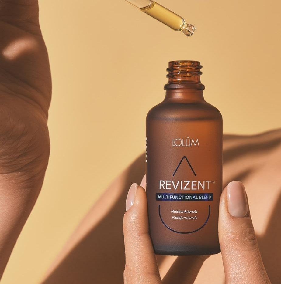 Mélange d'huiles essentielles REVIZENT™ de bien-être en soit, flacon de 50 ml, huile végétale multifonctionnelle.